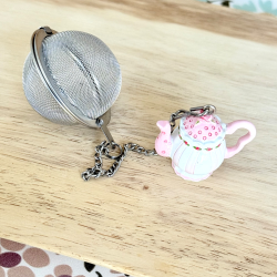 Infusores de té de acero inoxidable y resina pintada a mano.