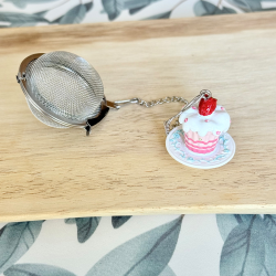 Infusores de té de acero inoxidable y resina pintada a mano.
